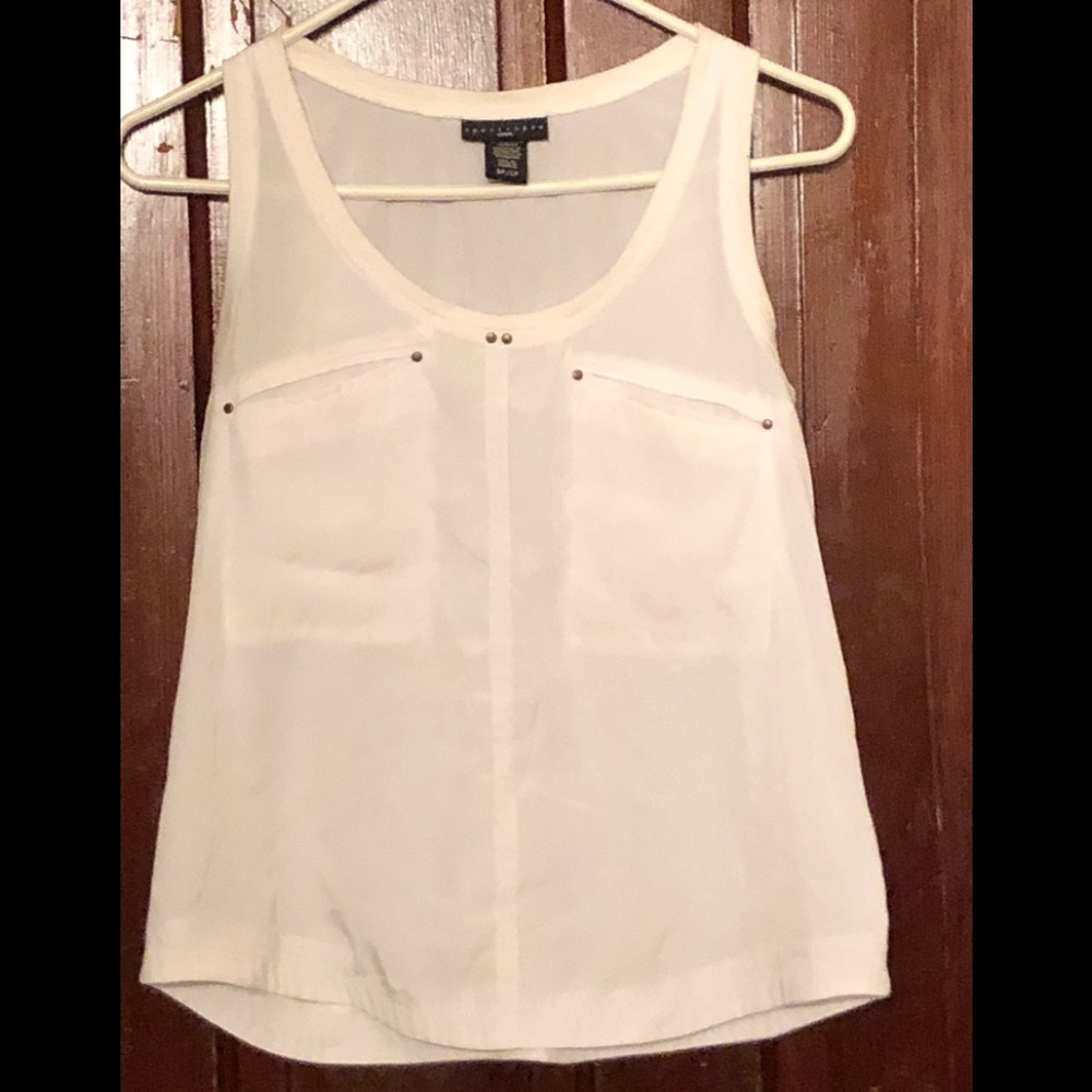 Apostrophe white tank.